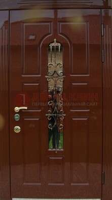 Красивая металлическая дверь со стеклом и ковкой ДСК-33 в Уфе